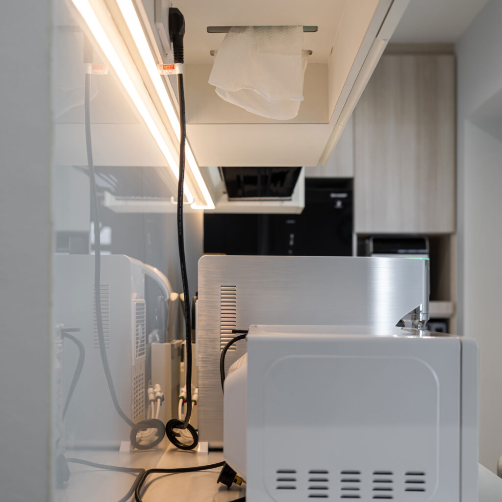 Custom Kitchen Lighting and Countertop Details by Design 2B